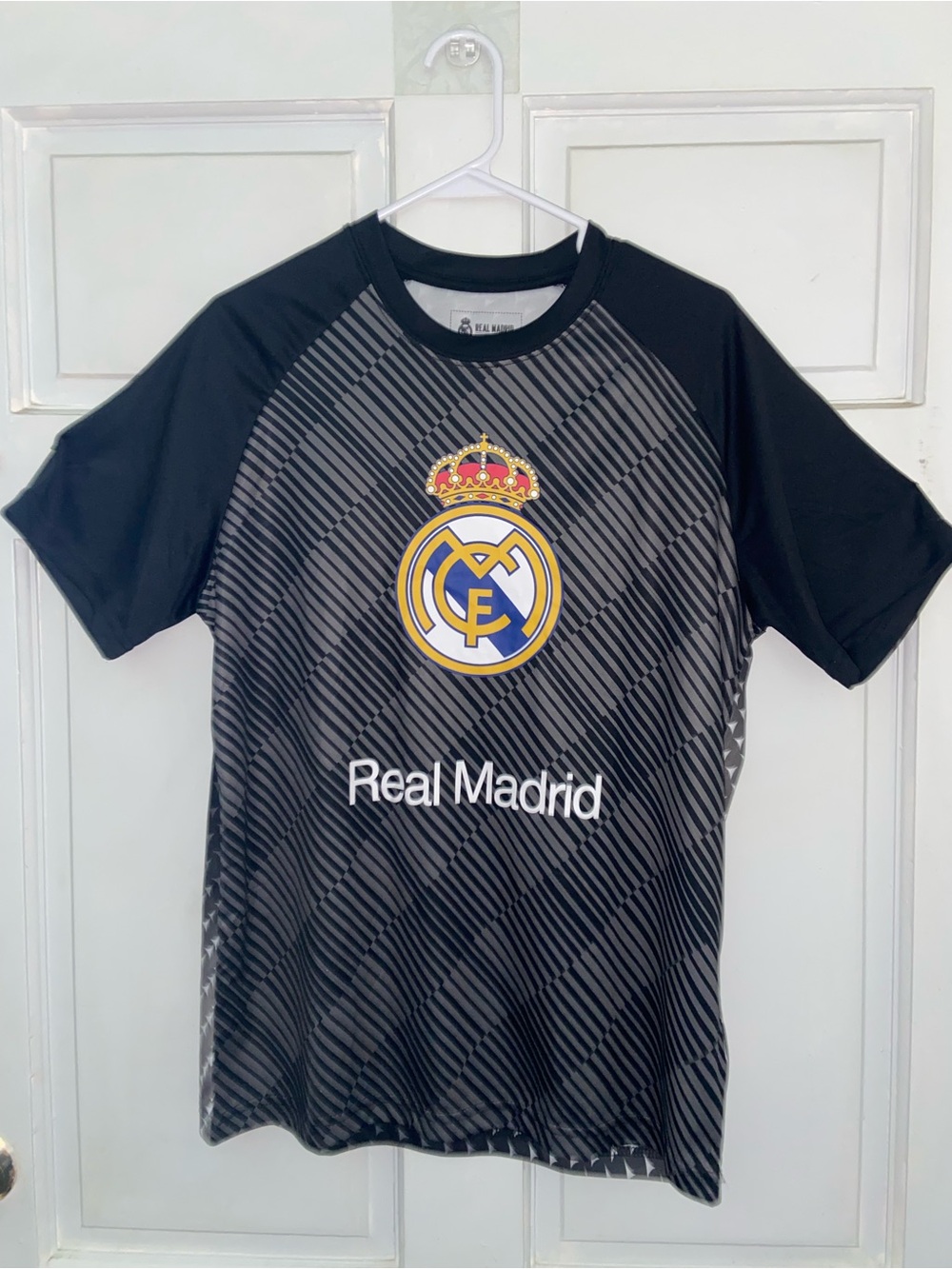 Real Madrid black & gray diagonal striped polyester jersey in size M